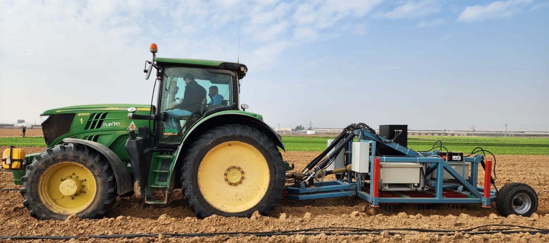 Clean Soil PEF unit towed behind a tractor in a prepared field